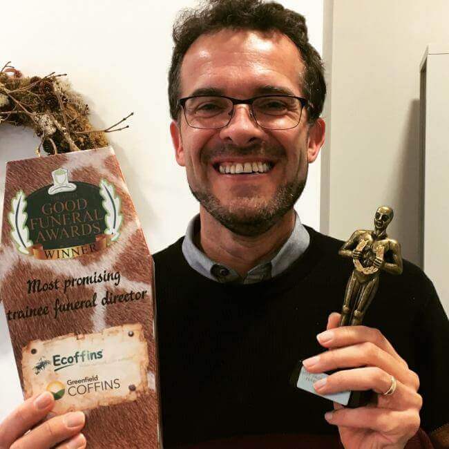 Andrew with an award