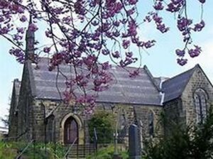 Outside a church with trees
