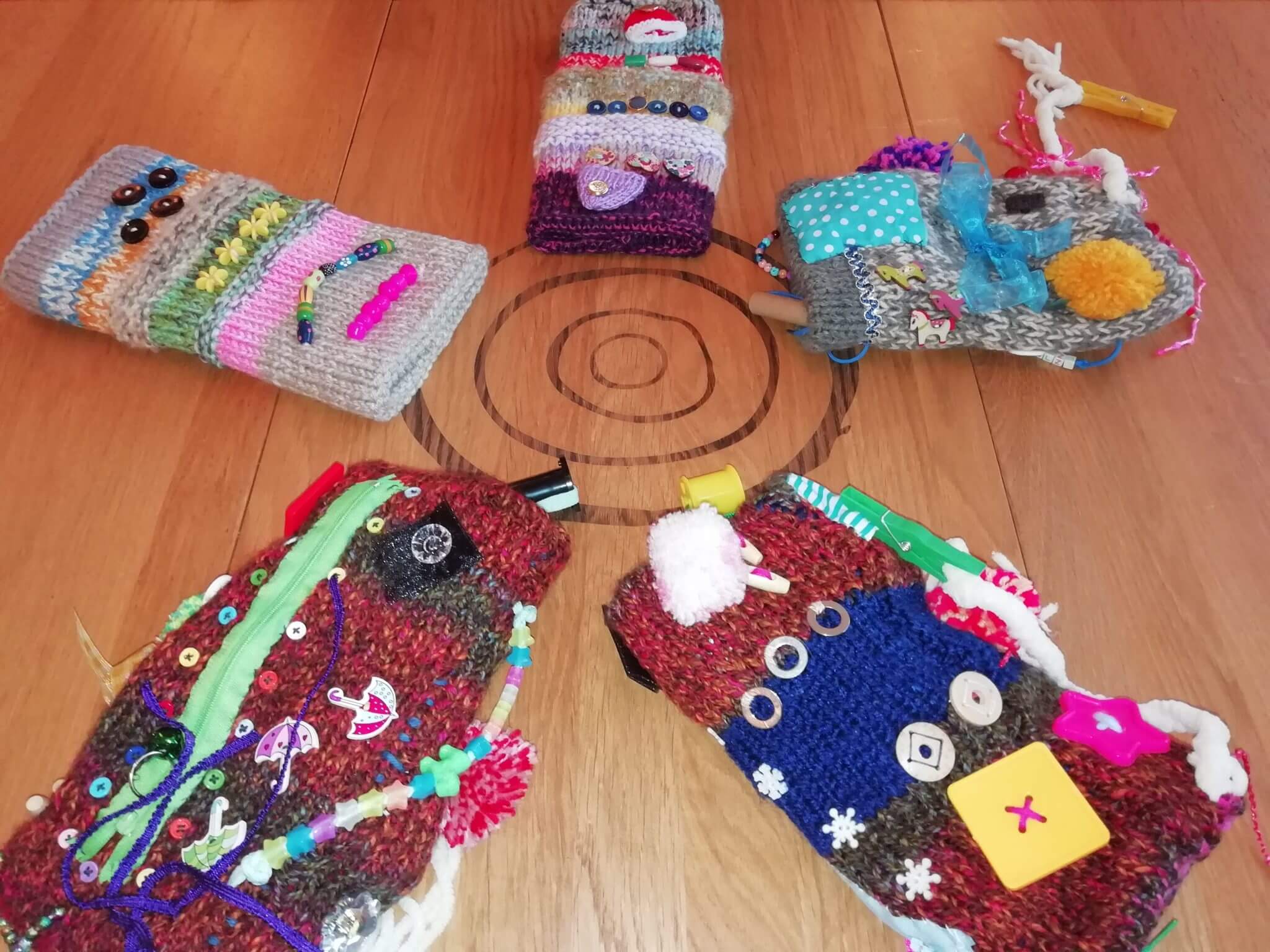 Knitted twiddle muffs