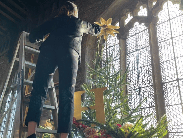 Full Circle Funerals putting up the tree at the minster