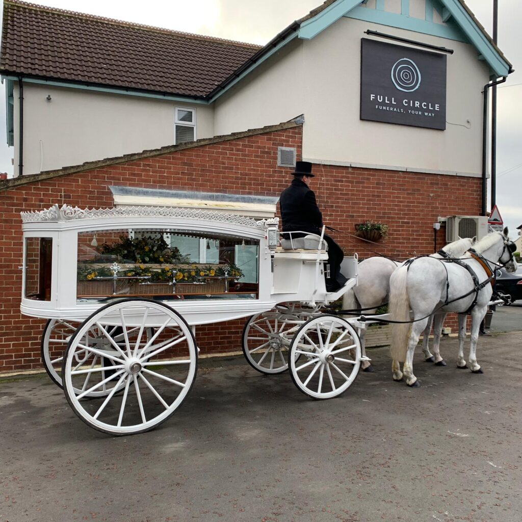 Alternative coffin transport horse and carriage