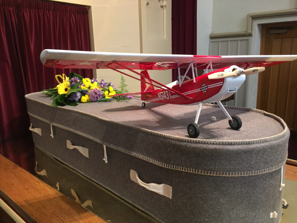Woolen coffin personalised plane flying hobby interest passtime model flowers yellow purple