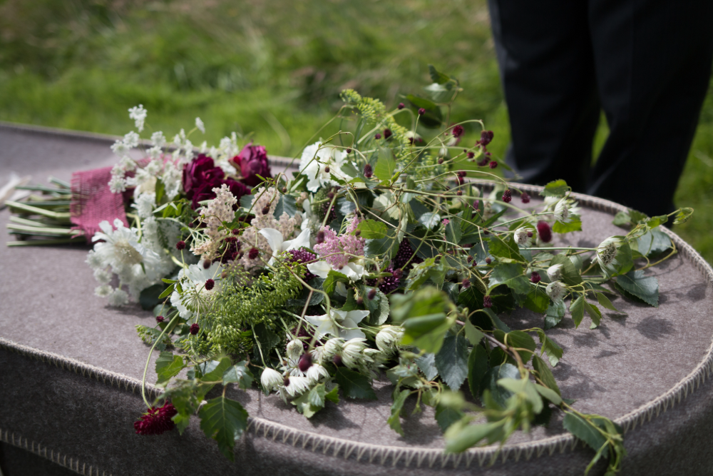 Natural Flowers on Woollen coffin